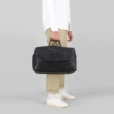 Buckle and Seam Canary Travel Bag