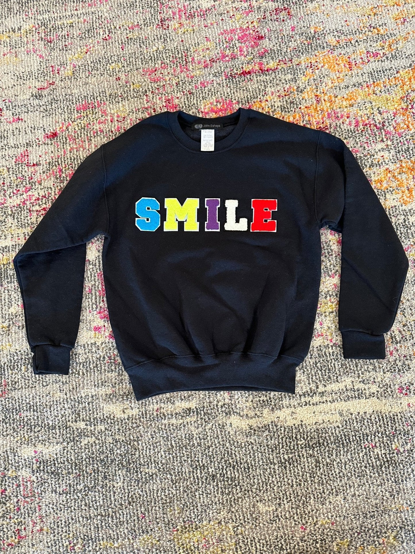 JET Fuzzy Letter Smile Crewneck in Black